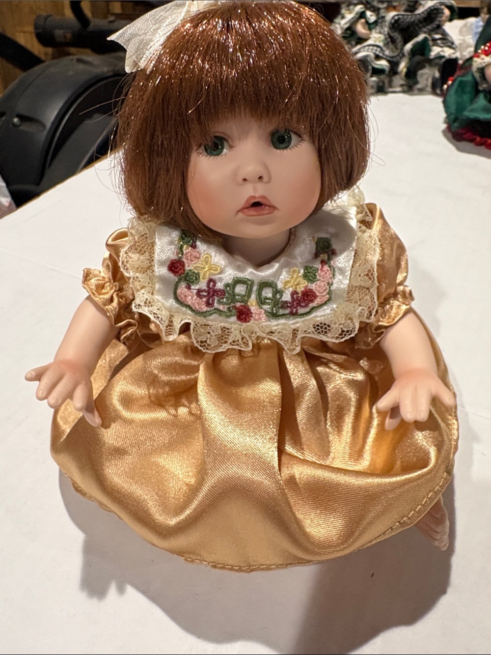 Gold Satin Decorative Baby Doll with Embroidered Collar